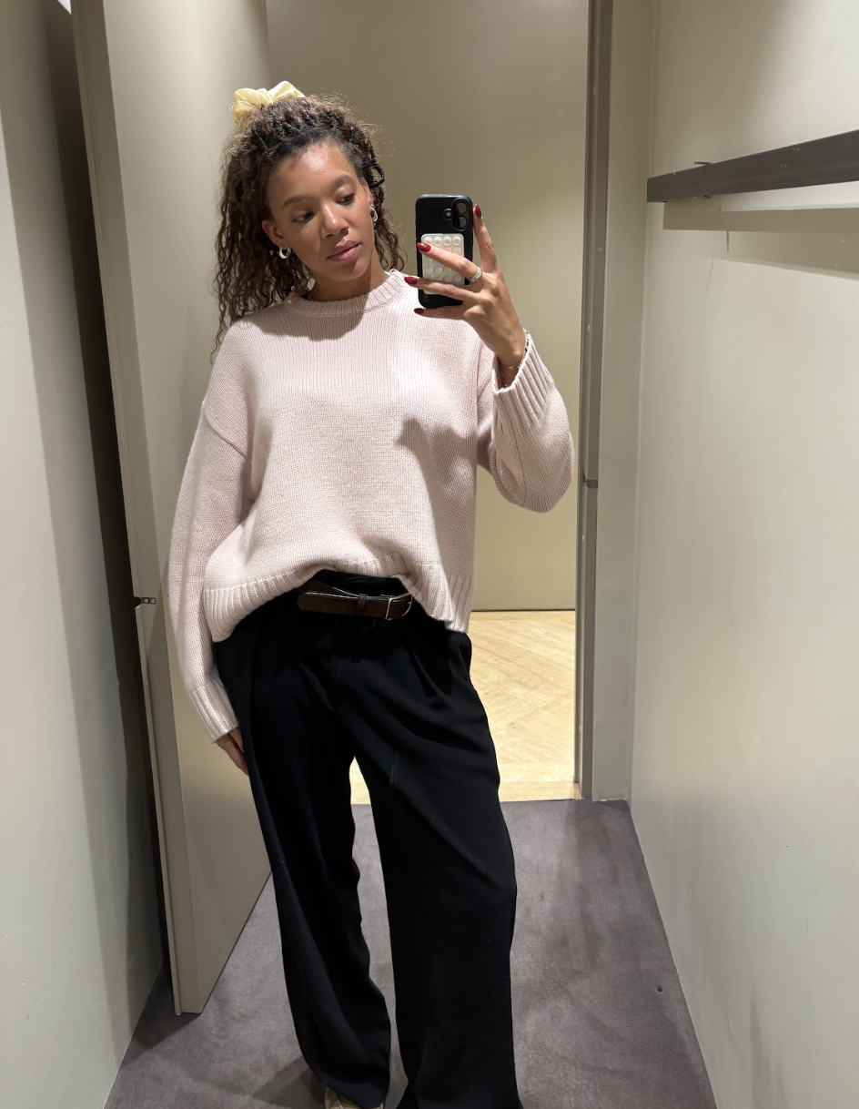 Fashion editor Imani wears the cos expensive looking knitwear.