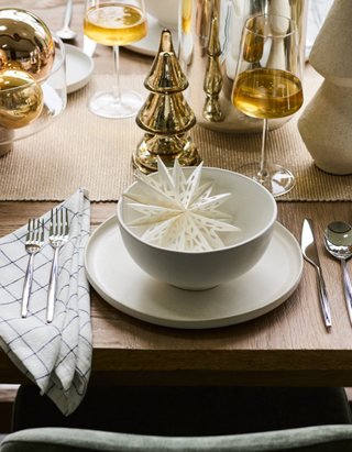 A tablescape with napkin placed on the left