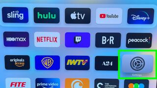 tvOS update process at the home screen with the Settings app highlighted