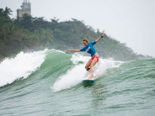 Female surfing