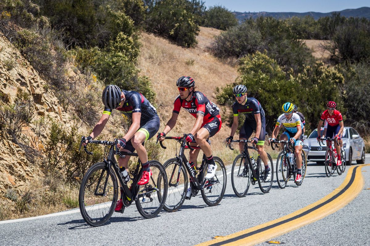 The break makes its way over one of today's climbs