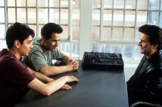 Ralph Macchio sits with Mitchell Whitfield and Joe Pesci in a scene from the film 'My Cousin Vinny', 1992.
