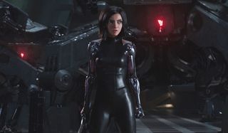 Alita: Battle Angel Alita stands in the Factory lobby, ready to fight the sentries