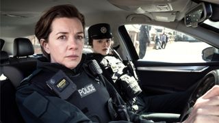 Helen McNally (Joanne Crawford) and Annie Conlon (Katherine Devlin) in a police car in Blue Lights