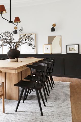 a dining room with a wood table