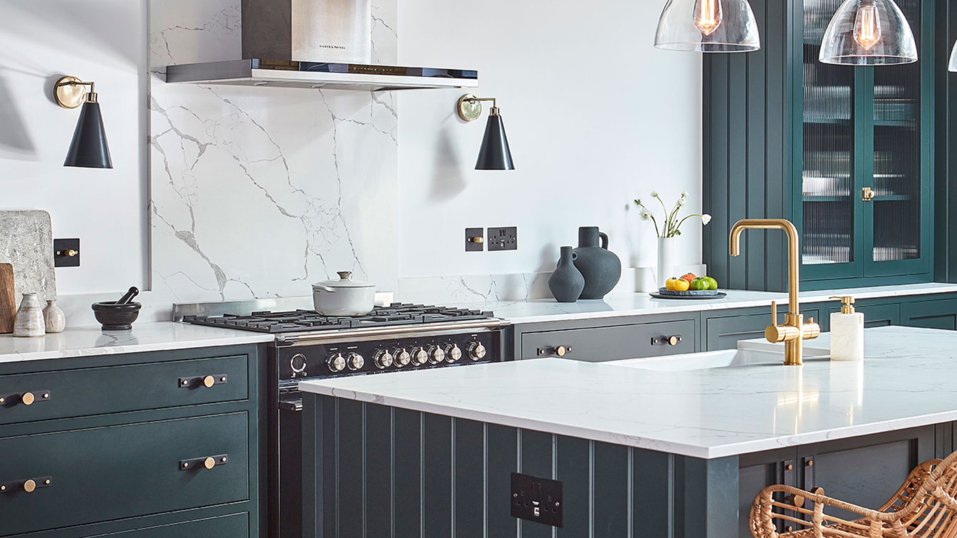 navy kitchen with island and cooker