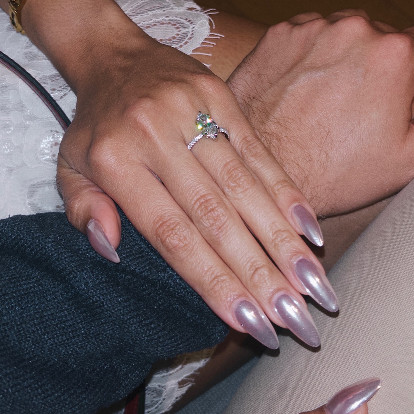 Lavender chrome nails.