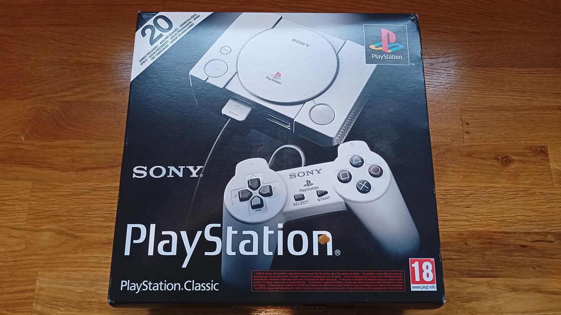 A photo of the PlayStation Classic box on a wooden table, for a review