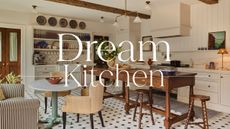 A war, layered kitchen with cream cabinets a wooden freestanding island, and a large plate rack at the top of a built-in hutch-style unit