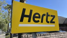 Hertz logo and branding pictured outside a rental shop on North Main Street, Walnut Creek, California.