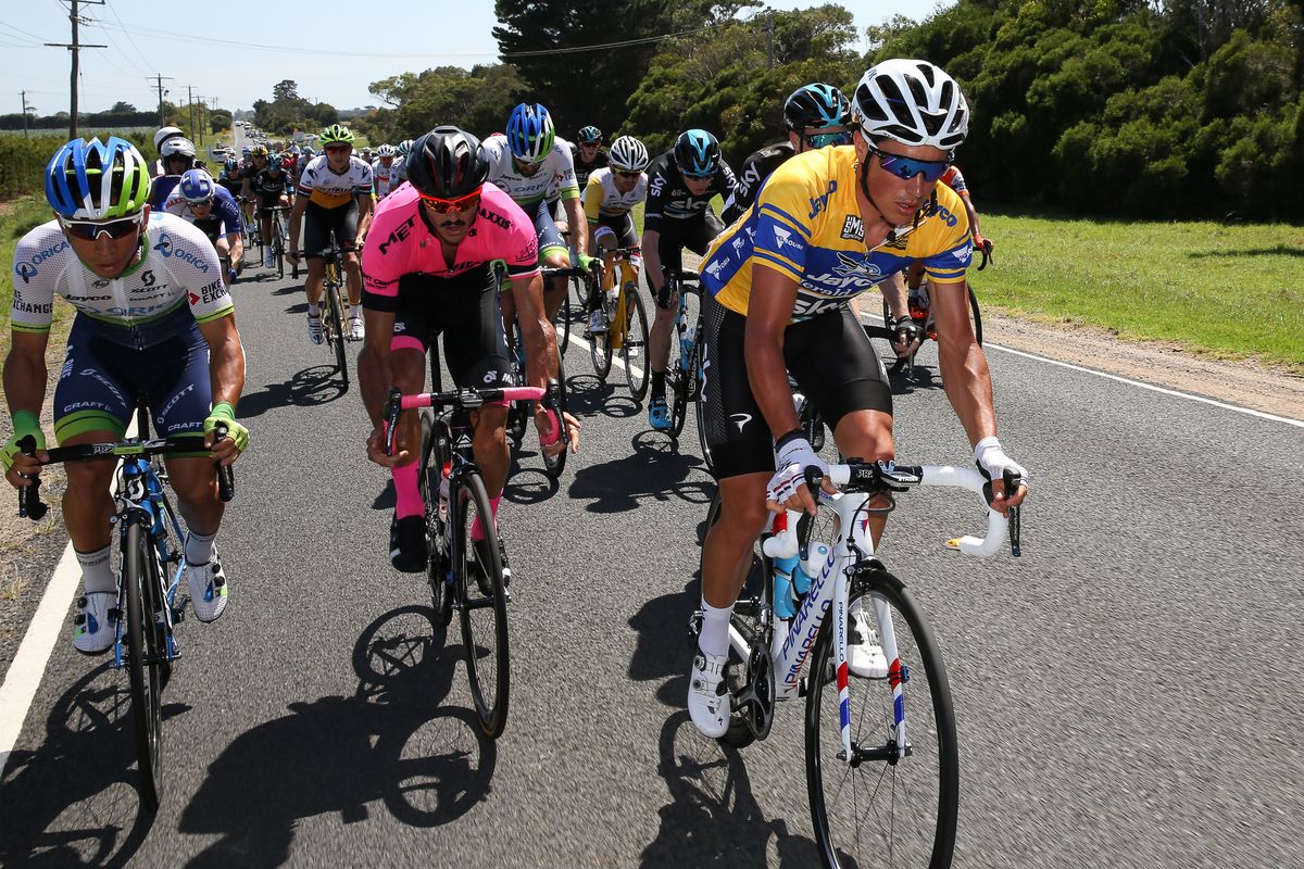 Caleb Ewan, Dan Bonello and Peter Kennaugh across the front of the peloton