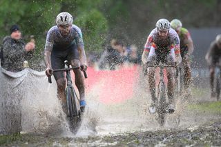 Dutch Joris Nieuwenhuis and Belgian Michael Vanthourenhout pictured in action during the men's elite race of the Cyclocross World Cup, in Terralba, Sardinia, Italy, Sunday 07 December 2025, stage 3 (out of 12) in the World Cup of the 2026-2027 season.BELGA PHOTO DAVID PINTENS (Photo by DAVID PINTENS / BELGA MAG / Belga via AFP)