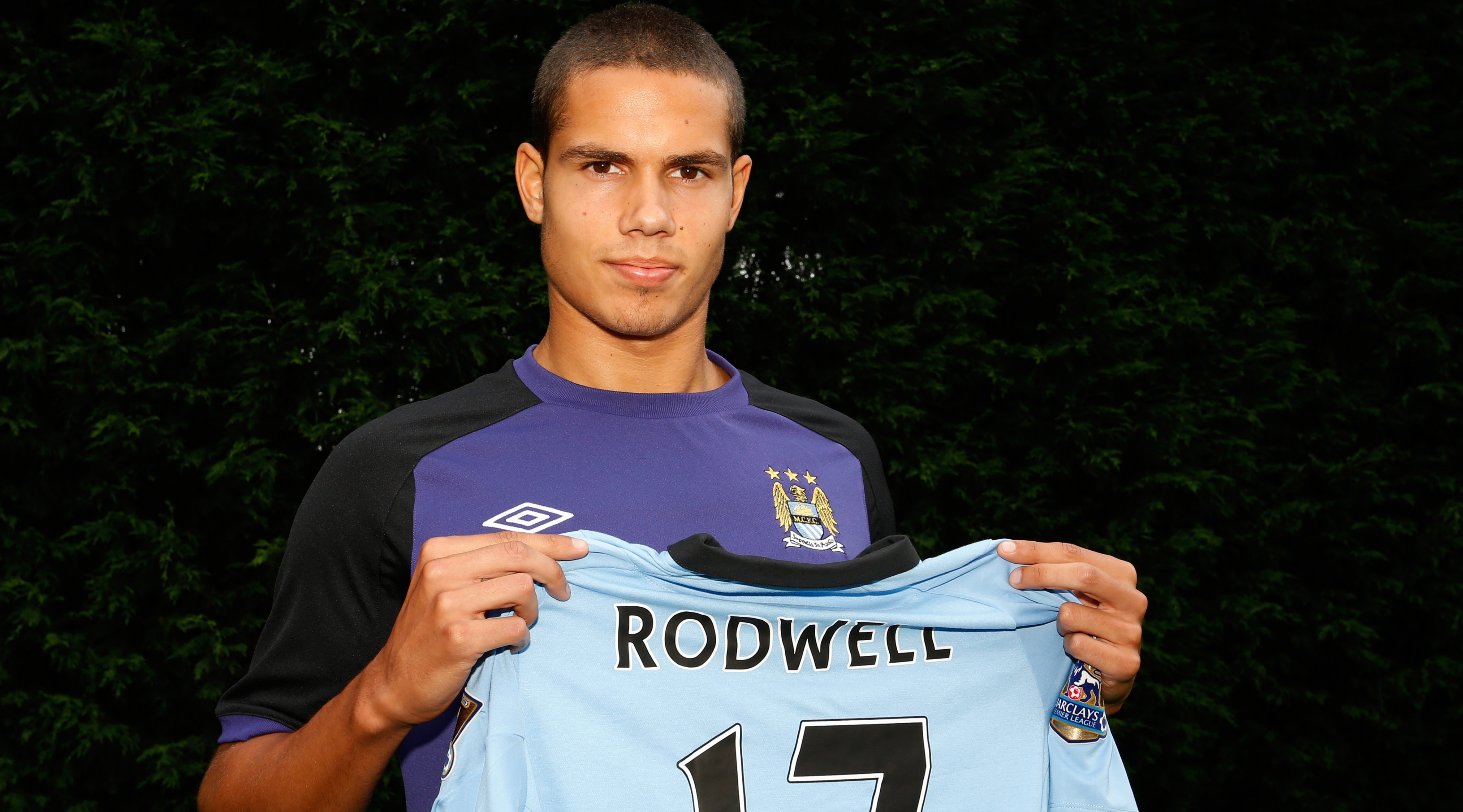 MANCHESTER, ENGLAND - AUGUST 17: New Manchester City player Jack Rodwell poses for a photograph at the MCFC Carrington Training Complex on August 17, 2012 in Manchester, England. (Photo by Paul Thomas/Getty Images)