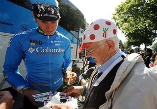 Thomas Lövkvist (Columbia) signs an autograph for a long time cycling fan.