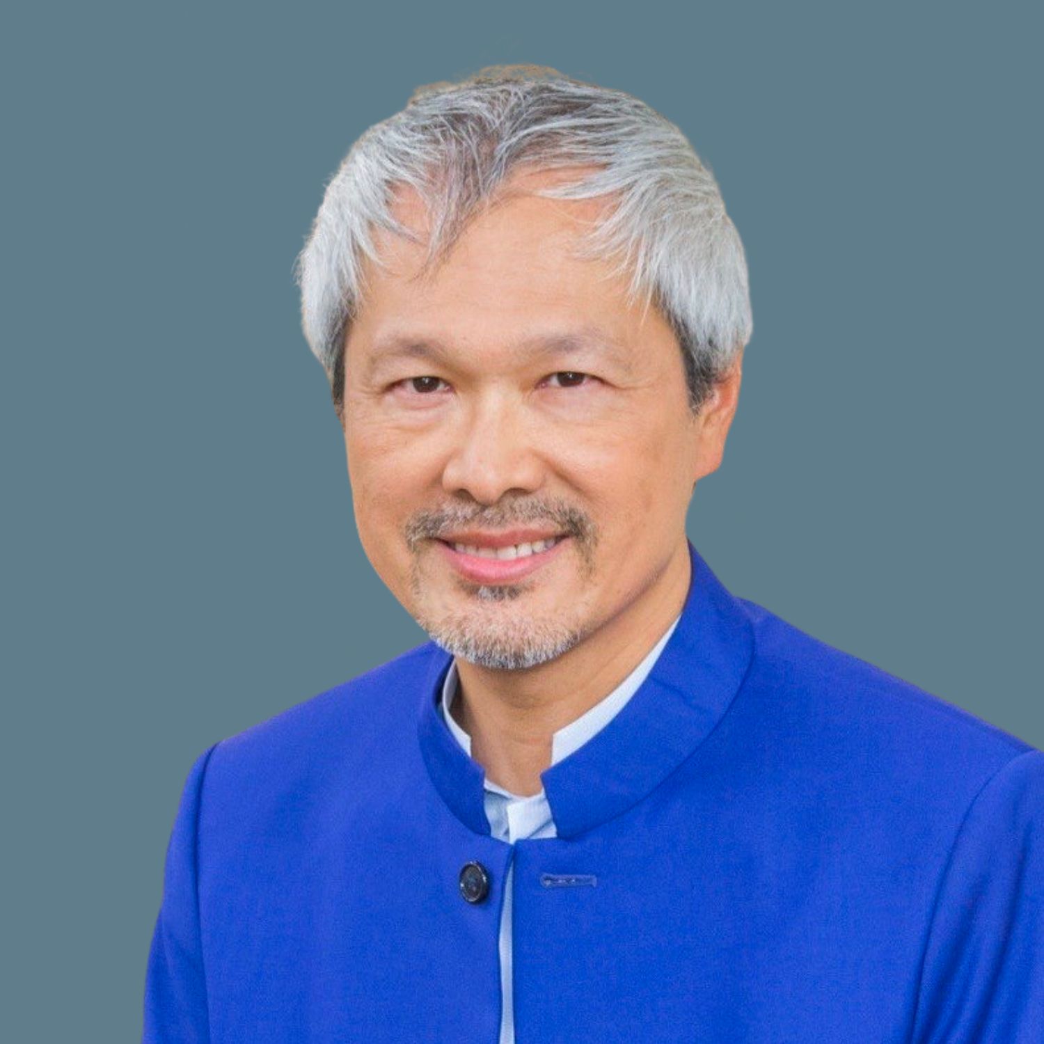 A head shot of Dr Mao Shing Ni.