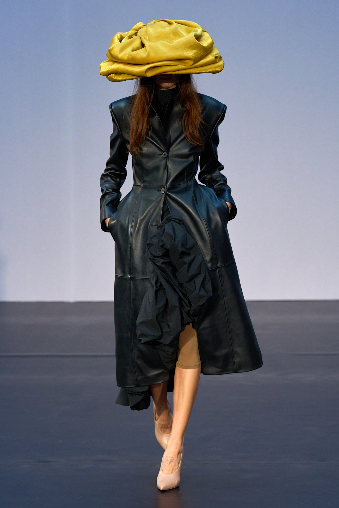 A model wore the black-and-yellow color combination on Magda Butrym's Spring 2026 runway