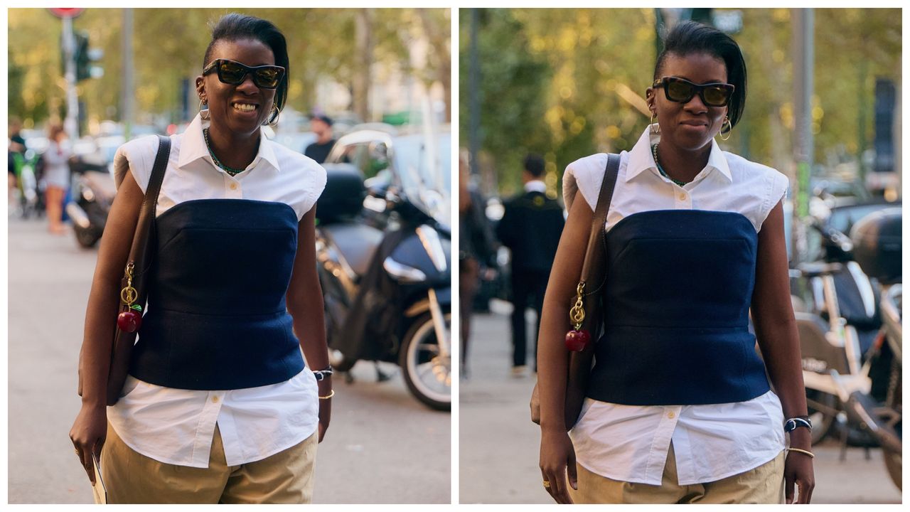 Nikki Ogunnaike wearing a white button down top, a blue corset, and khaki pants