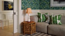Rattan light in green living room
