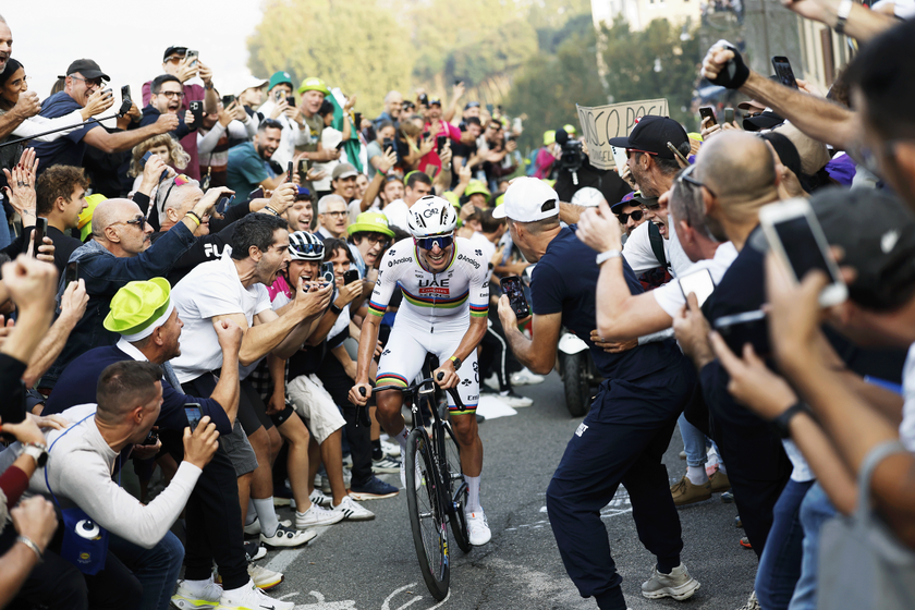 BERGAMO, ITALY - OCTOBER 11: Tadej Pogacar of Slovenia and Team UAE Team Emirates competes in the breakaway while fans cheers during the 119th Il Lombardia 2025 a 241km one day race from Como to Bergamo on October 11, 2025 in Bergamo, Italy. (Photo by Luca Bettini - Pool/Getty Images)