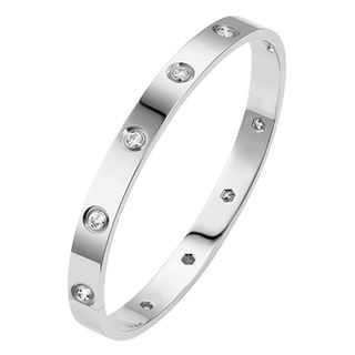 flat lay image of silver bangle