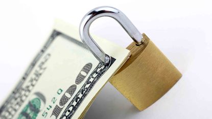A lock protects a $100 bill