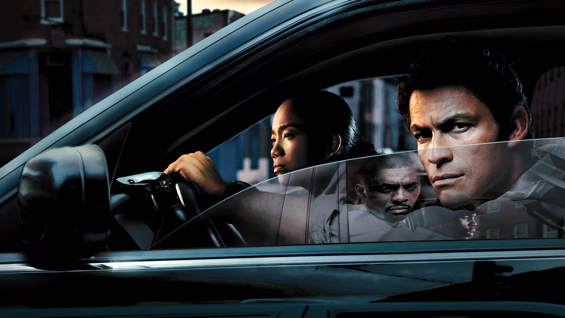 Dominic West as James McNulty and Sonja Sohn as Shakima Greggs in The Wire.