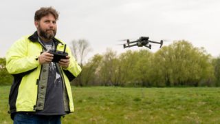 Me flying the Mavic 3T Enterprise Thermal drone wearing a high-vis top