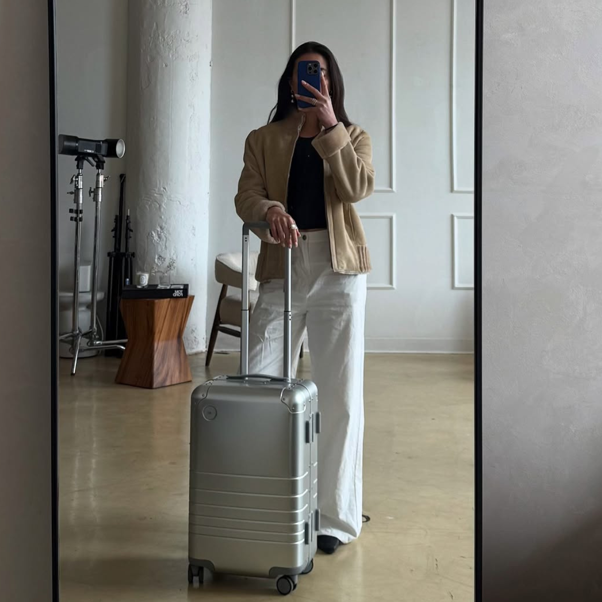woman wearing chic airport outfit 2025