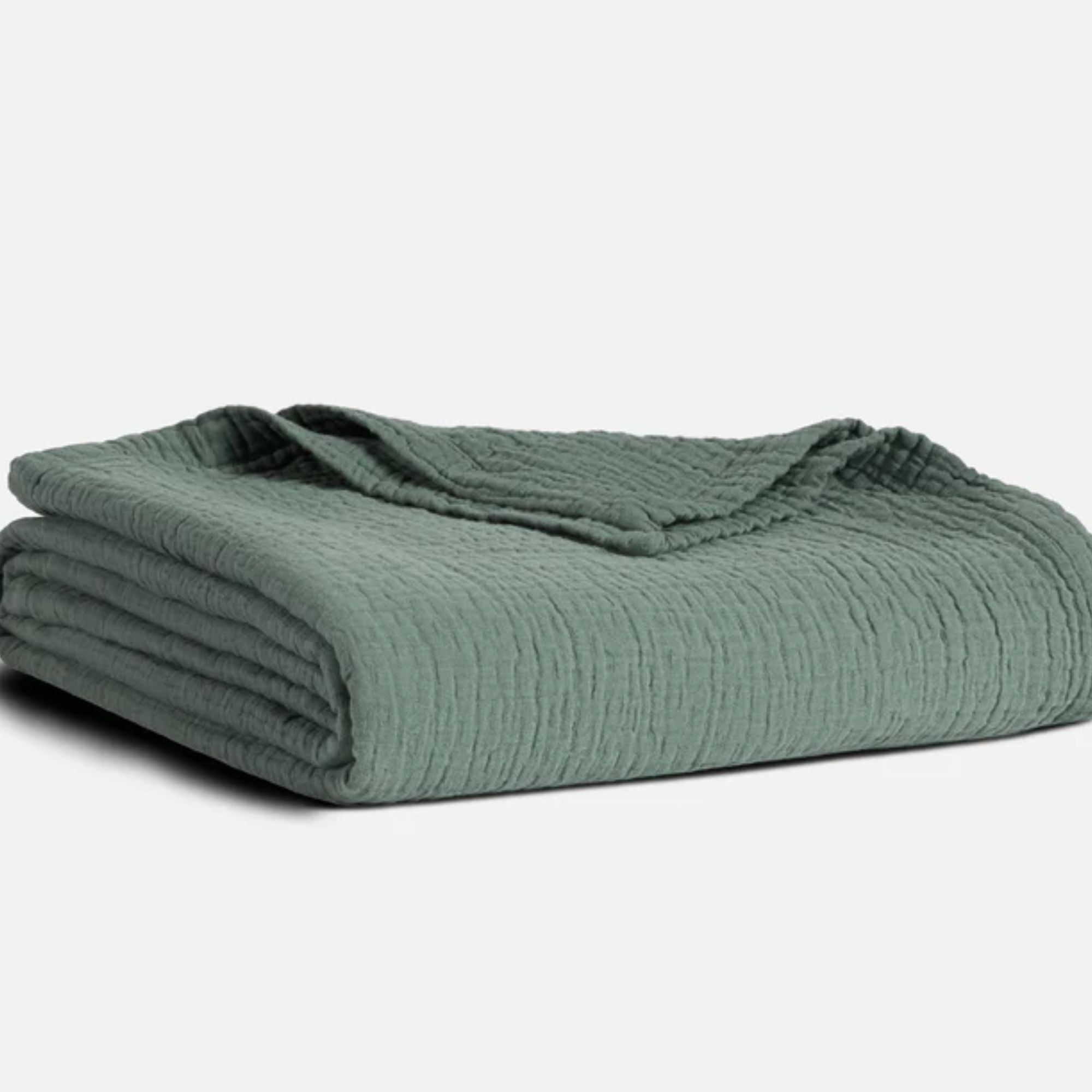 Dark green folded Breezeweave crinkle blanket