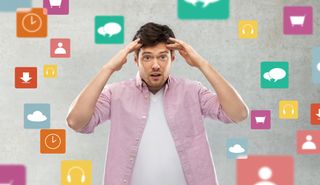 Man overwhelmed by too many apps
