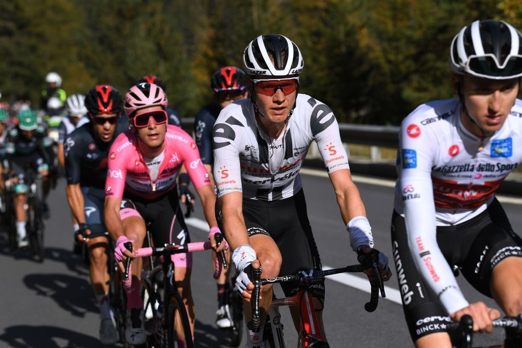 LAGHI DI CANCANO ITALY OCTOBER 22 Joao Almeida of Portugal and Team Deceuninck QuickStep Pink Leader Jersey Wilco Kelderman of The Netherlands and Team Sunweb during the 103rd Giro dItalia 2020 Stage 18 a 207km stage from Pinzolo to Laghi di Cancano Parco Nazionale dello Stelvio 1945m girodiitalia Giro on October 22 2020 in Laghi di Cancano Italy Photo by Tim de WaeleGetty Images