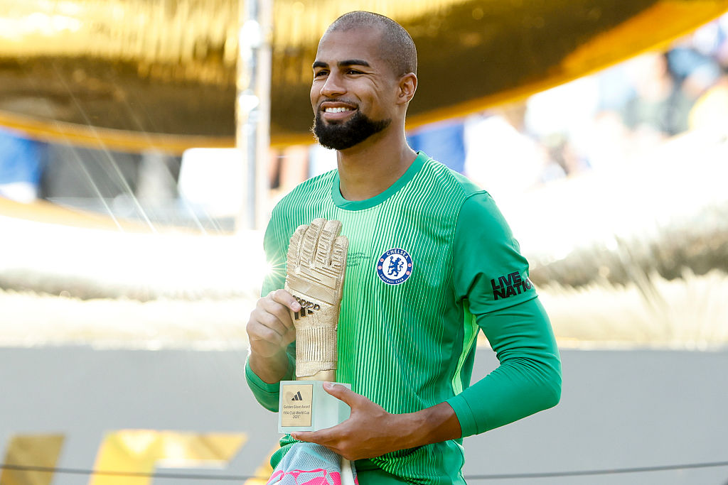 EAST RUTHERFORD, NEW JERSEY - JULY 13: Chelsea goalkeeper Robert Sanchez holds the &amp;amp;apos;best young player award&amp;amp;apos; during the trophy ceremony following the FIFA Club World Cup 2025 final football match between Chelsea FC and Paris Saint-Germain (PSG) at MetLife Stadium on July 13, 2025 in East Rutherford, New Jersey. (Photo by Jean Catuffe/Getty Images)