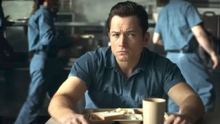 Best Apple TV shows: Taron Egerton as James "Jimmy" Keene having lunch in prison during the series, Black Bird.