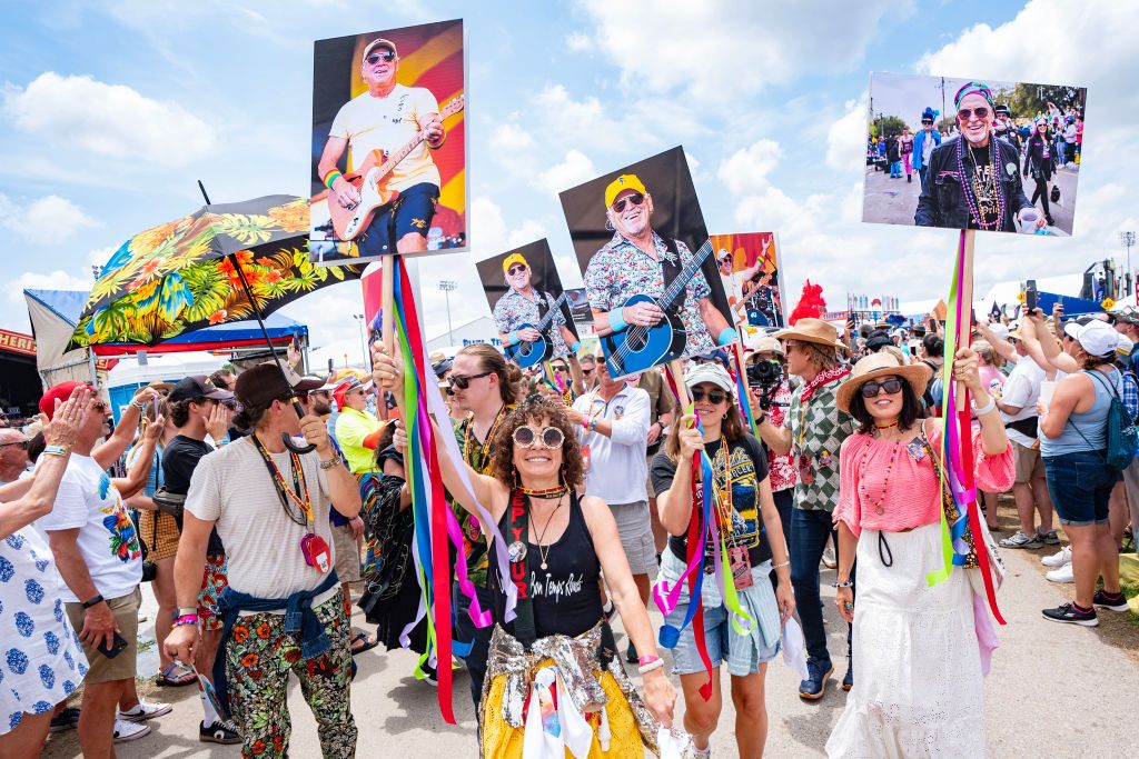 Savannah Buffett, Delaney Buffett and Melanie Buffett participate in a jazz funeral for Jimmy Buffett on Day 7 of 2024 New Orleans Jazz &amp; Heritage Festival at Fair Grounds Race Course on May 04, 2024 in New Orleans, Louisiana. 