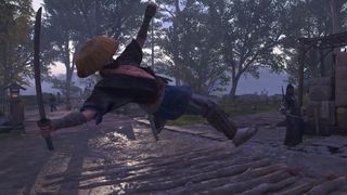 Assassin's Creed Shadows screenshot of an enemy flying in the air from Yasuke after he's performed a war kick