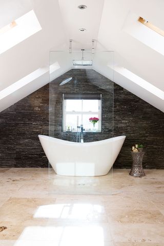 Bathroom with walk in shower and freestanding bath
