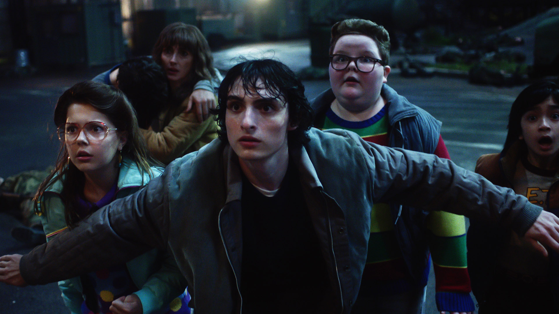 Mike holding back the new kids and Joyce in Stranger Things season 5