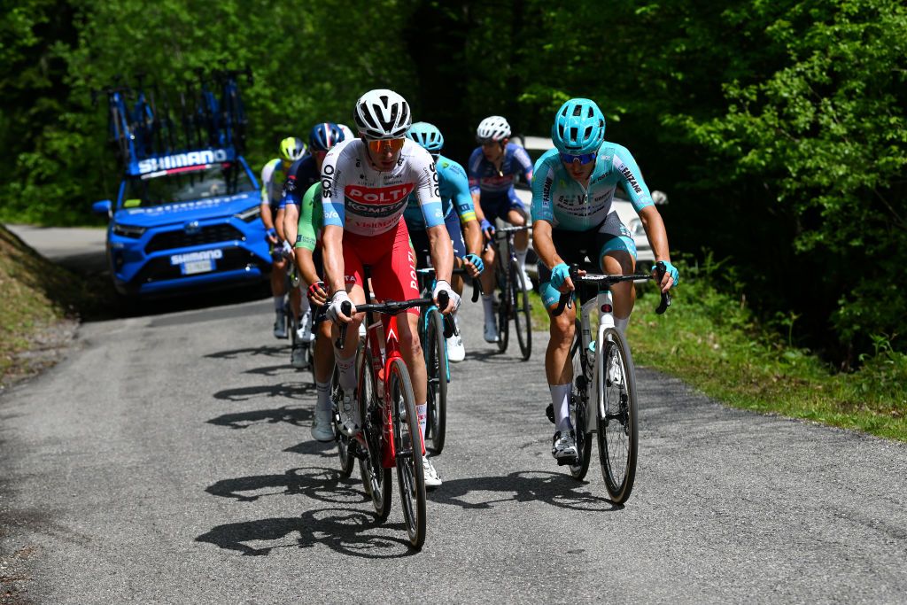 LIVIGNO MOTTOLINO ITALY MAY 19 LR Davide Bais of Italy and Team Polti Kometa and Alessandro Tonelli of Italy and Team VF Group Bardiani CSF Faizane compete in the breakaway 4during the 107th Giro dItalia 2024 Stage 15 a 222km stage from Manerba del Garda to Livigno Mottolino 2387m UCIWT on May 19 2024 in Livigno Mottolino Italy Photo by Dario BelingheriGetty Images