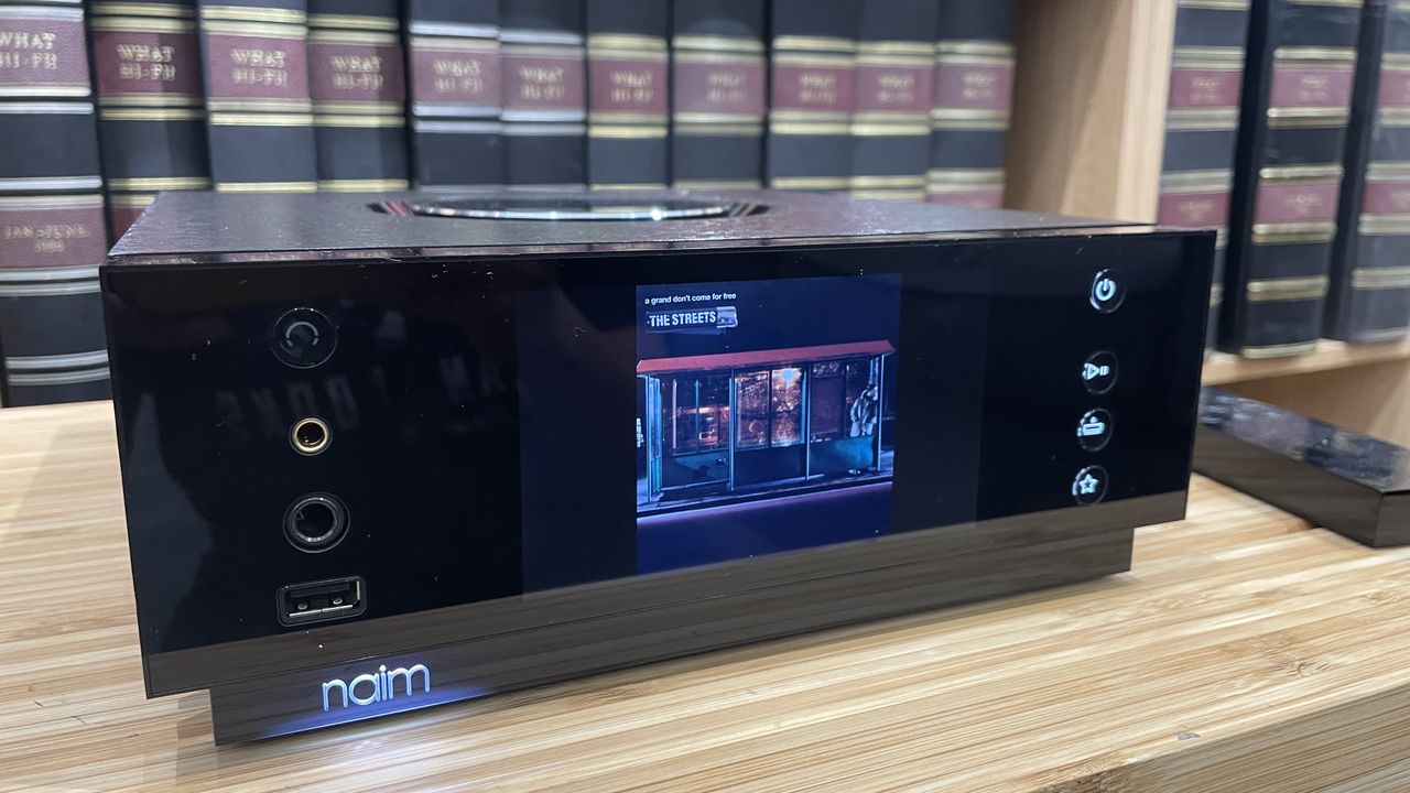 Naim Uniti Atom Headphone Edition on wooden rack