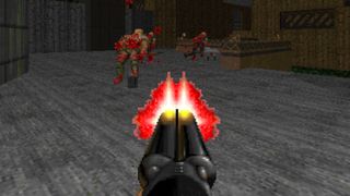 Doom 2's Super Shotgun fires at a group of enemies