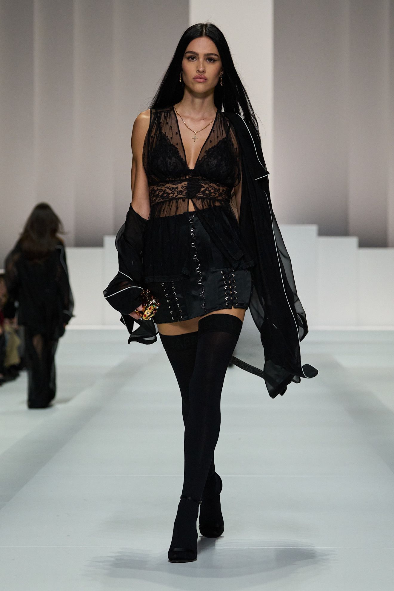 A model walks the runway from dolce & Gabbana spring/summer 2026