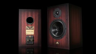 Castle Windsor Duke speakers in mahogany finish, on black background