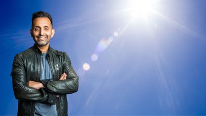 Dr Amir Khan standing in sunny sky, representing the signs of dehydration in hot weather