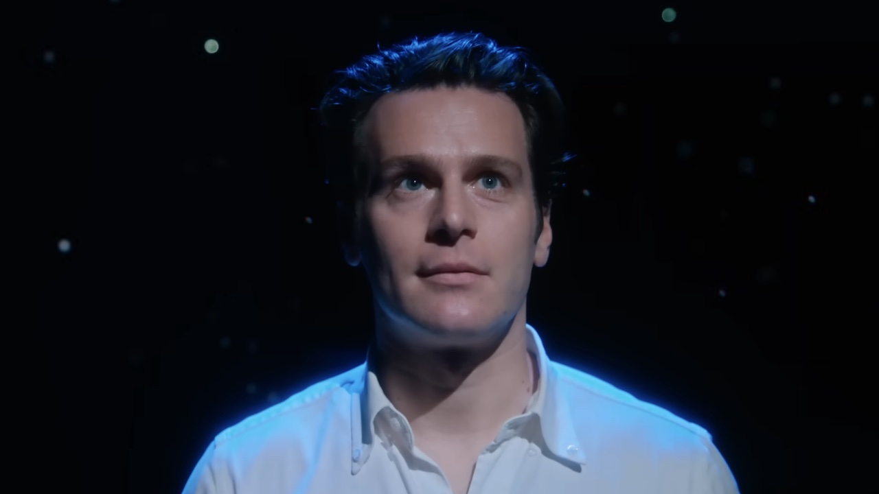 Jonathan Groff looking into the audience in Merrily We Roll Along 