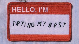 Sewn-on patch reading 'I'm trying my best'