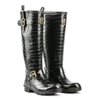 Cut out of glossy croc Holland Cooper black wellies on a white background