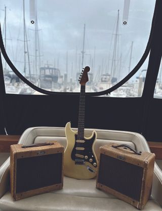 Garcia’s Olympic White ’64 Strat with a pair of vintage Champ amps.