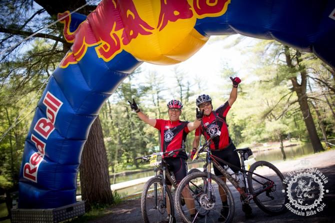 Andres Correa and Juan Ernesto Champsaur, racers from Panama, at the finish line of the Trans-Sylvania Epic