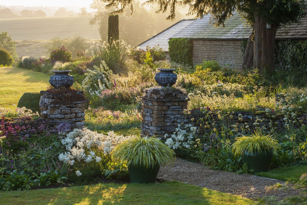 Pettifers Garden, Oxfordshire, created by the late Gina Price, is a favourite spot of Clive Nichols. This early morning view is taken from the back of the house.