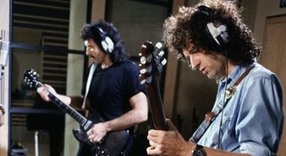 Tony Iommi (left) and Brian May track in the studio in 1989 to raise money for the Armenian earthquake appeal.